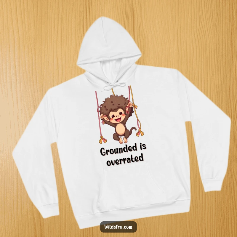 Funny monkey with a flamboyant afro expertly swinging from strands of yarn, featured on a cozy and humorous hoodie.