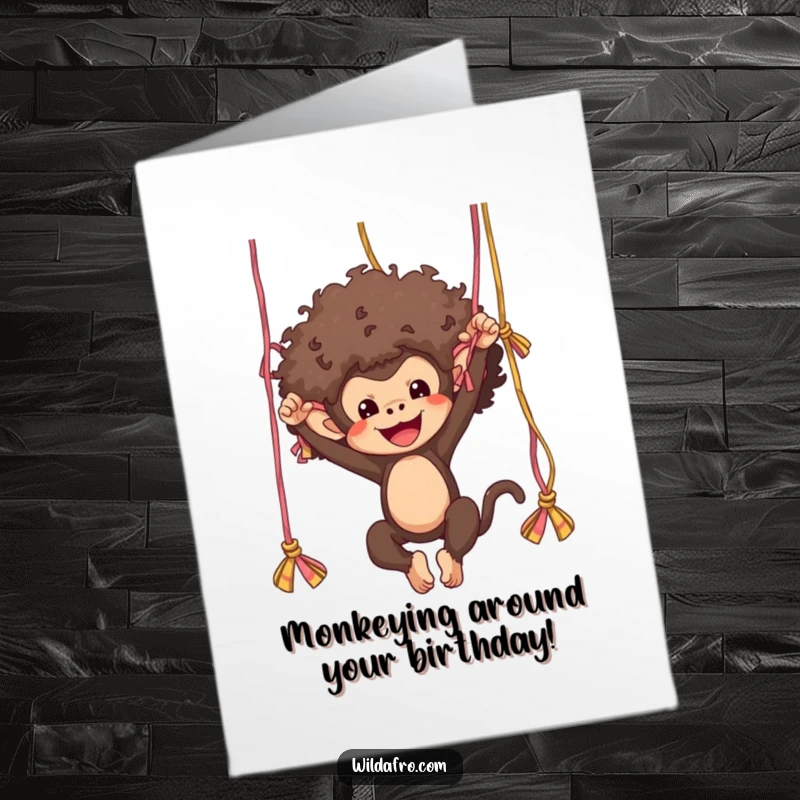 Funny Free Printable Birthday Card: Afro Monkey in a tutu swinging wildly from colorful yarn strands, full of joy.