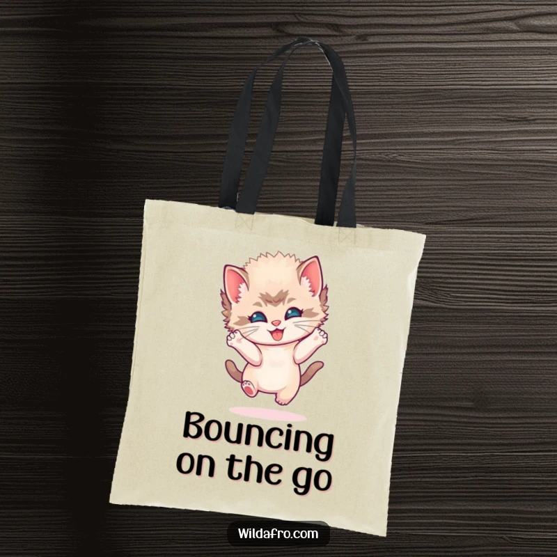 Funny kitten afro tote bag with a playful kitten sporting a round afro, bouncing joyfully with infectious energy and charm.